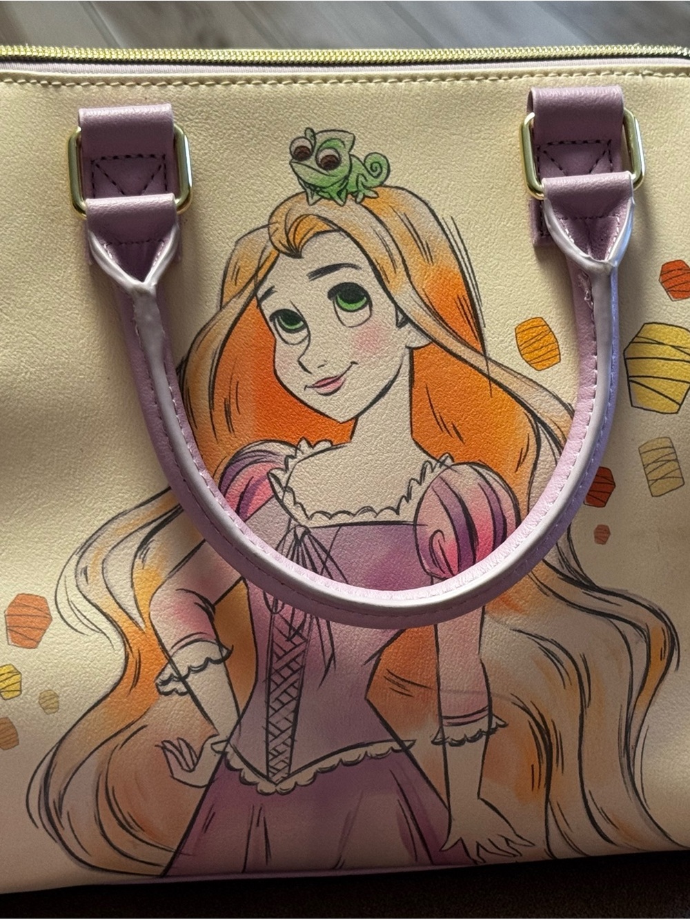 Loungefly Rapunzel Graphic Satchel in Cream and Purple